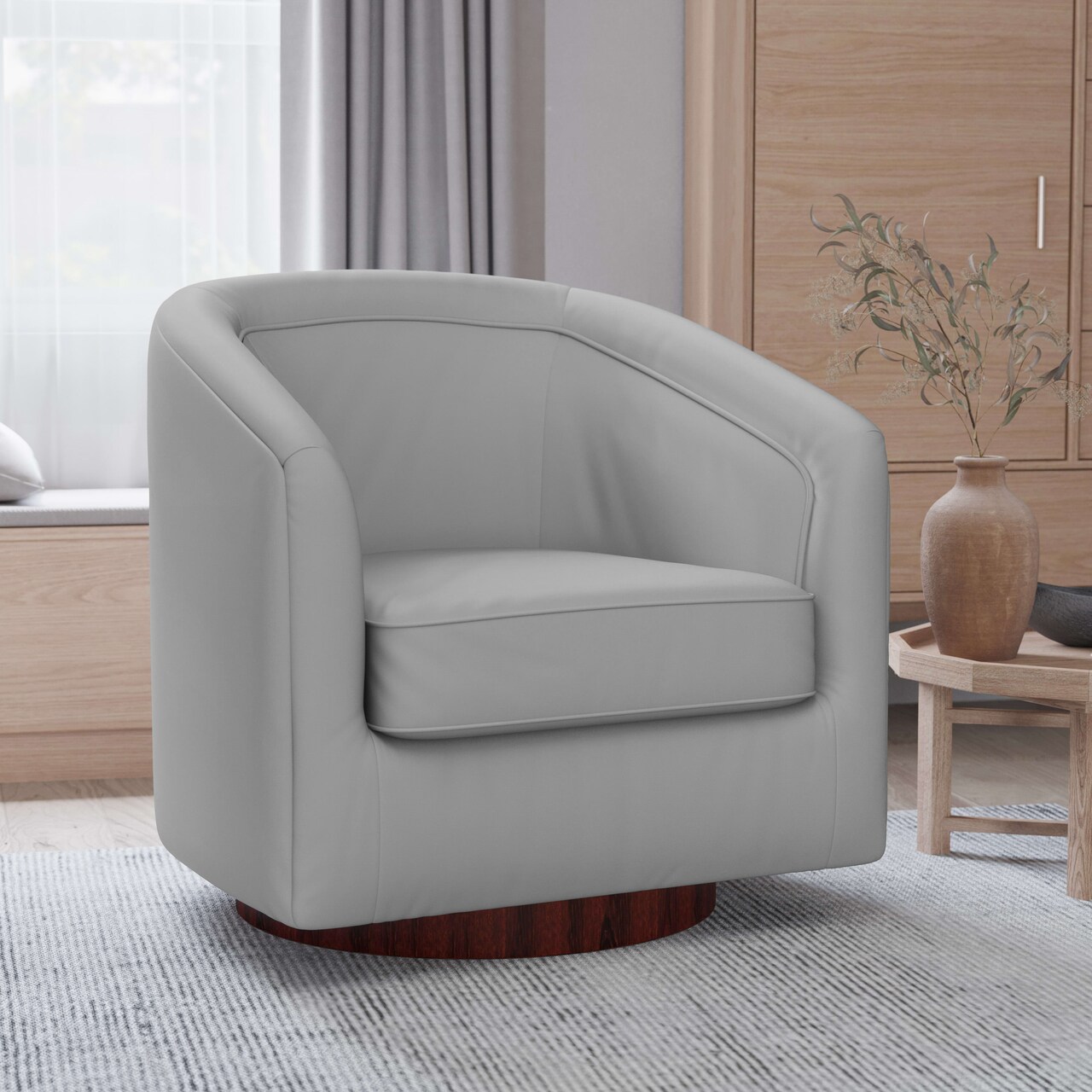 Merrick Lane Wyn Upholstered Club Style Barrel Chair with Sloped Armrests and 360 Degree Swivel Base in a Vinyl Wrap